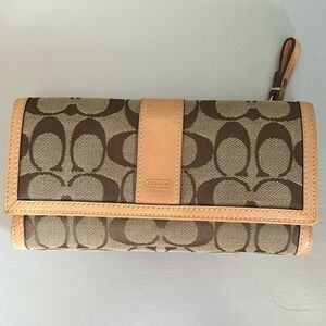 Vintage Trifold Coach Wallet with checkbook holder. Like new condition.